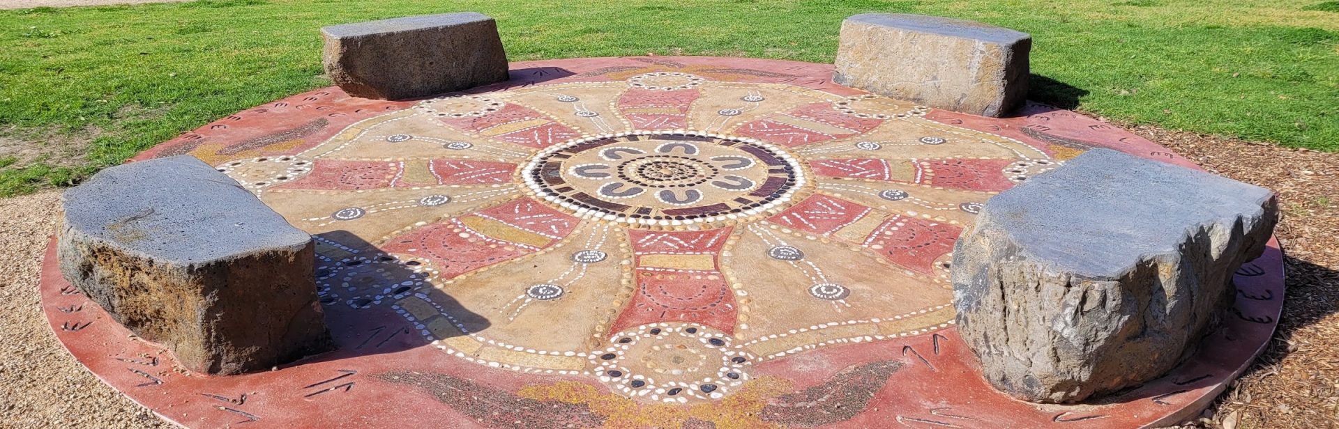 The Gathering Circle highlights the significance of the Wurundjeri Woi-wurrung people and the connection it provides for the community to gather, to connect, to learn and share stories. Artist Simon Thomson a Wurundjeri Woi - wurrung/Yorta Yorta woman.ge stories