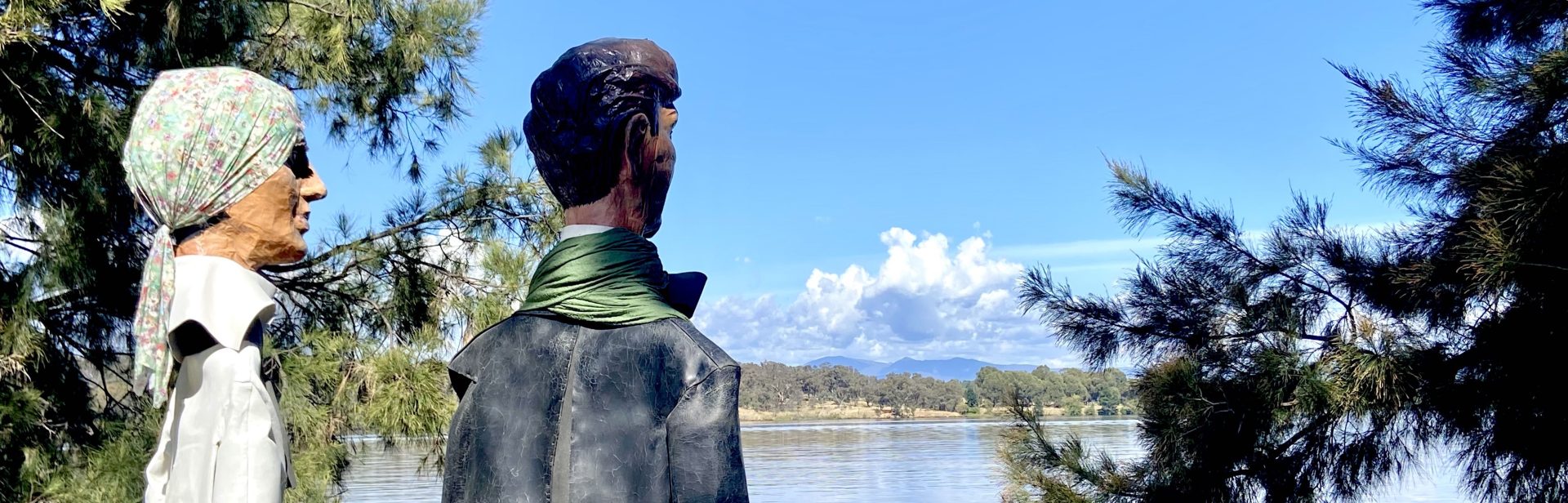 The  Gigante Griffin Puppets look over Lake Burley Griffin