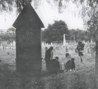 Pak Louey Jan O Hoy Mrs Louey Win O Hoy and Stephen O Hoy at White Hills Cemetery for Ching Ming c1960s From the Golden Dragon Museum photographic collection related image