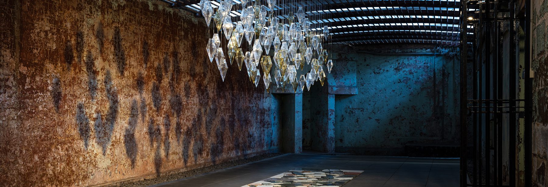 Artwork: Alex Seton 'Everything was Beautiful, and Nothing Hurt' 2022 Soda Glass, nylon, steel, marble offcuts. Dimensions variable. Glassblower: Katie Ann-Houghton. Set within the historic men's exercise yard.