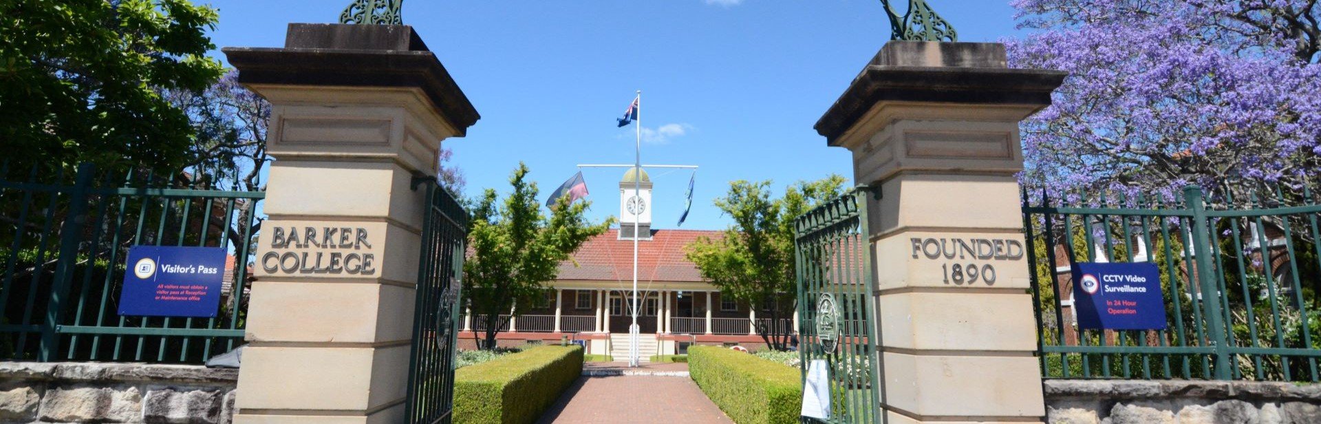 Photograph of the Administration Block, formerly the original 1925 classroom block through the original Mint Gates that once stood at the Mint in Sydney.