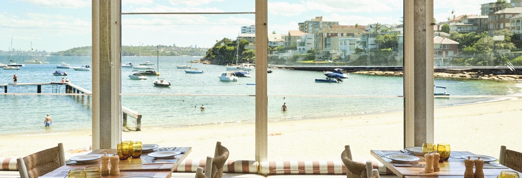 Enjoy lunch overlooking Little Manly Beach