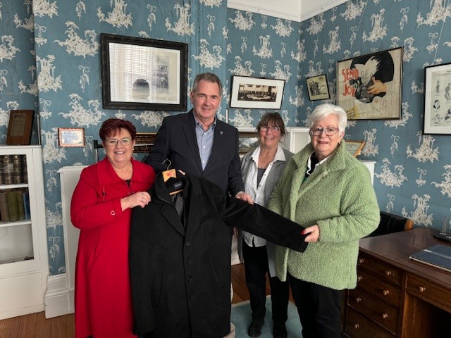 Senator Anne Urquhart, Councilor Steve Martin, Ann Teesdale and Lynn Laycock with the most recent Prime Ministerial jacket from Anthony Albanese